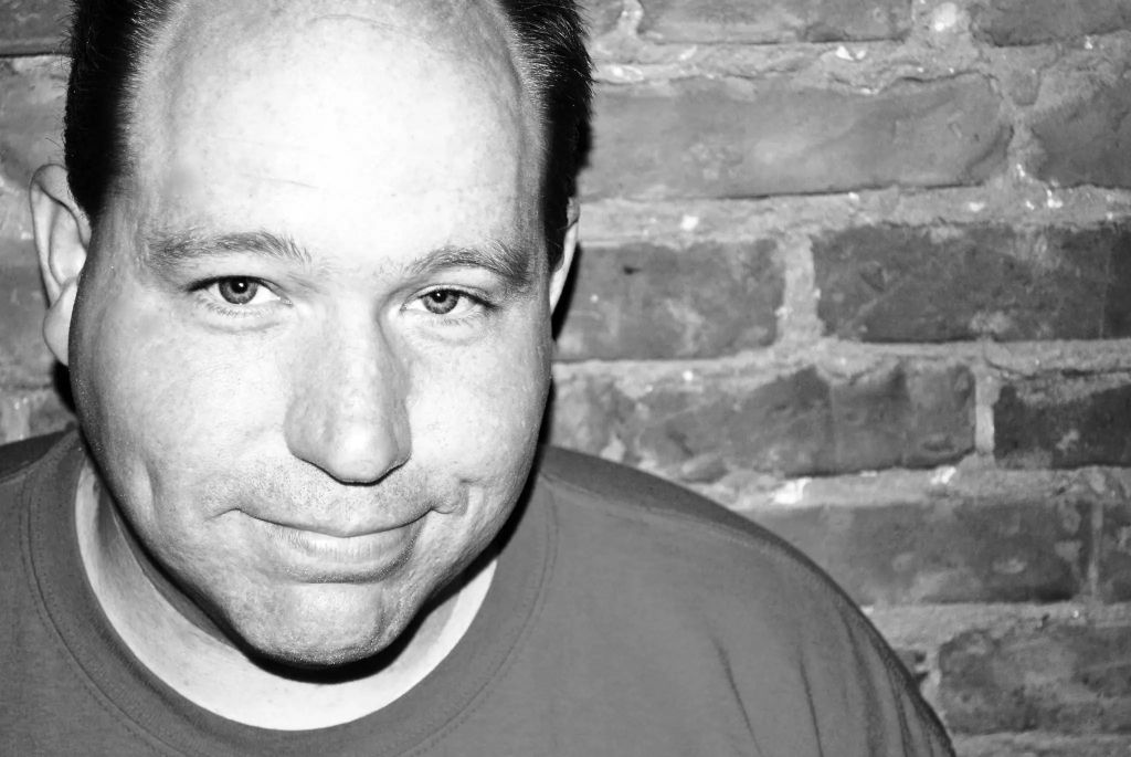 Black and white profile photo of Brian Newhall, WordPress Consultant, bpnWebTech